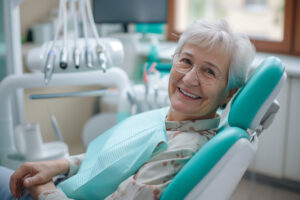 Senior woman sitting in dentist chair